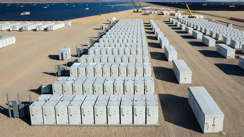 Lithium-Ion battery storage farm near a large body of water.